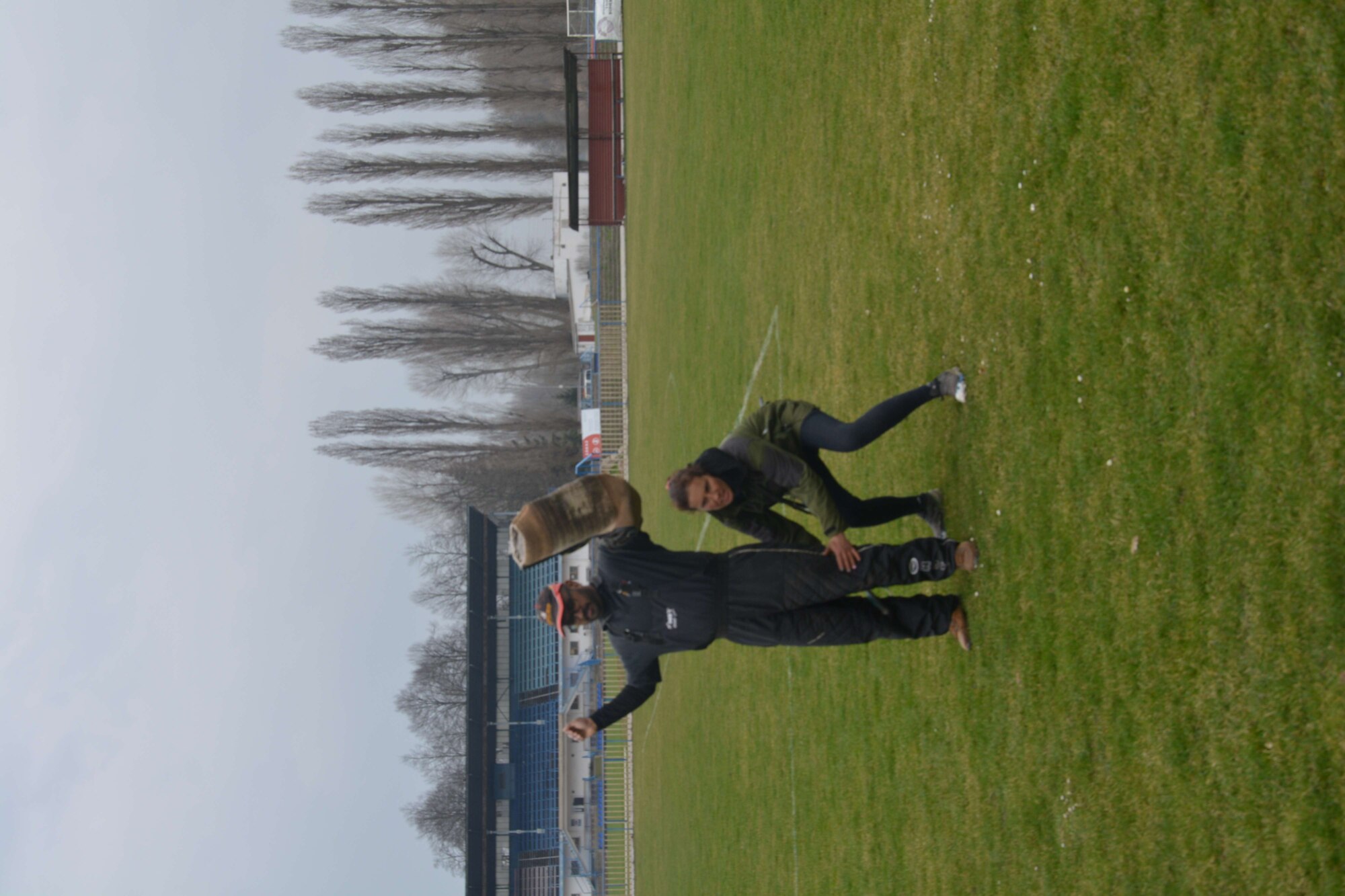 Body search suspect while dog is put on alert